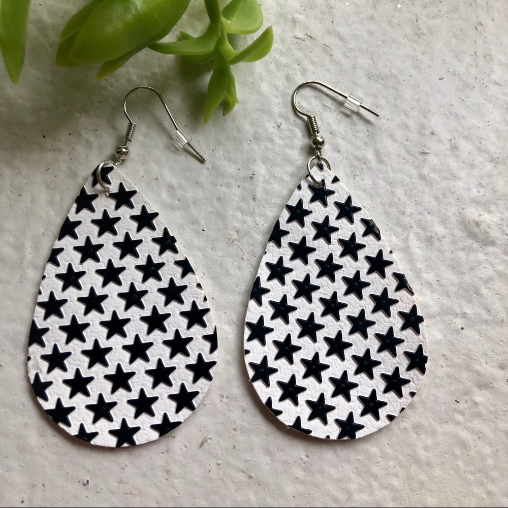 PU Leather white/black star earrings.